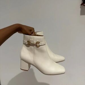 Chic White Ankle Boots with Gold Accent
